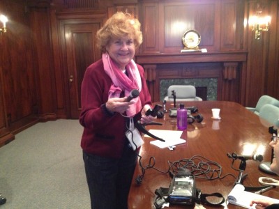  Esther Weiner practices how to properly use the digital recording equipment.