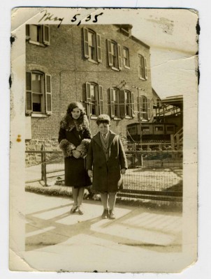 Fourteen-year-old Morty Weiner and his sister Ruth, 19, visiting their aunt in the Jewish neighborhood near Druid Hill Park, May 1935. CP 5.2013.1 