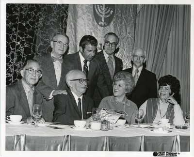 Ten people called to identify the attendees at Samuel Neistadt’s 60th birthday party. Seated Left to Right: 1. Reuben Livov 2. Samuel Neistadt  3. unidentified 4. Doris Weikers Kahn Standing Left to Right: 1. Hyman Winnik 2. Carl Friedler  3. Jacob Jaffe 4. Isaac H. Taylor. Thanks Susan Weikers Balaban, Fay Adler, Dorothy Livov, Barbie (Livov) Weiss, Ronald Taylor. Richard Taylor, Deborah Taylor, Bruce Taylor, Ellen Friedler Eisenstadt, and Norma Wollod!