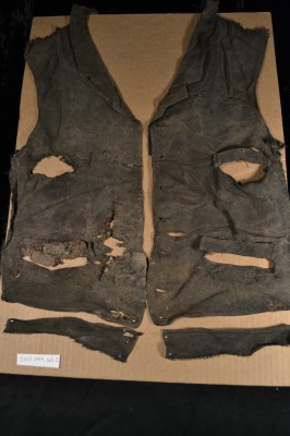A "mended" 19th century men's vest with pockets.