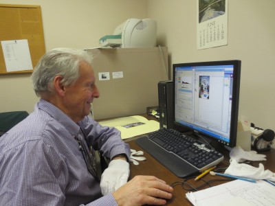 Volunteer Marvin Spector scans photos faster than we can attach them!