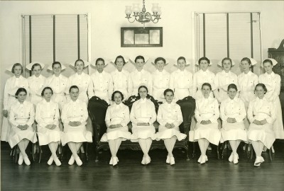 Daisy D. Carawan (Mrs. Barnett) is in the photograph of the 1937 graduating class of the Sinai Hospital School of Nursing. 2010.020.070