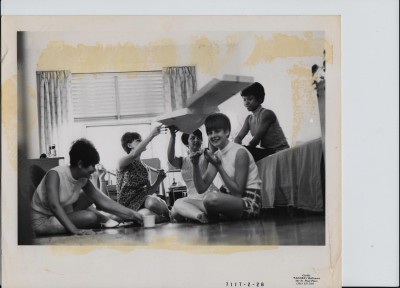 A group of Sinai nurses in gathered in their residence eating pizza, no date. Courtesy of Sinai Hospital of Baltimore.