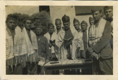 These include an image of a rabbi and troops at a Passover seder in Paris in 1918, 1993.173.1.15