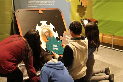 John Ruarah Middle School students explore The A-Mazing Mendes Cohen exhibit.