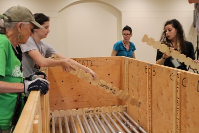The poles were also placed in the wooden crates tactically so that when it would be ready to set up in Texas, the poles that would be going on the floor (the foundation) would be the first to come out of the box. That way, the exhibit can literally be built from the bottom-up.