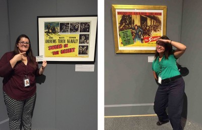  Collections Intern Kaleigh Ratliff, and Education and Programming Intern Falicia Eddy encourage visitors to vote for, and take pictures by their favorite poster.