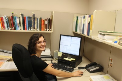 Exhibitions Intern Sophia hard at work at her desk.