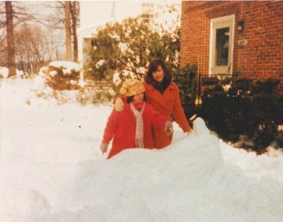 Tracie and her sister Emily, outside in the snow.