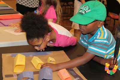 This summer, JMM docent Robyn Hughes created an art program for campers with visual impairments from the Maryland School for the Blind in which students toured Voices of Lombard Street and then built neighborhoods out of art supplies.