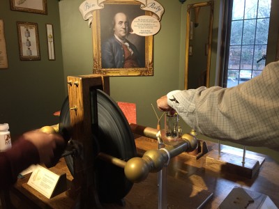 For example, at Benjamin Franklin’s Electricity Party, one person turned cranks while another grabbed a metal bar to light sparks and ring bells.