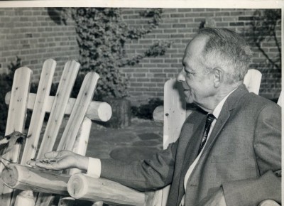 Malcolm W. Lowenstein and his tame mockingbird, ca. 1960.  Gift of Rita Lowenstein. JMM 1992.185.3