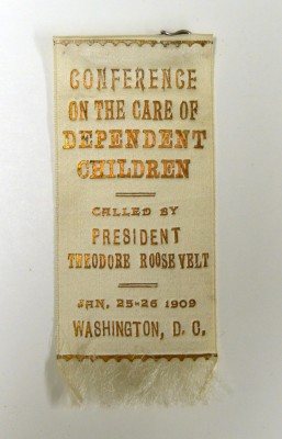 Satin ribbon with safety pin, made by G.N. Meyer Mfg., Washington, D.C. “Conference on the Care of Dependent Children, Called by President Theodore Roosevelt, Jan. 25-26 1909, Washington, D.C.”  Gift of Judge Jacob M. Moses. JMM 1963.42.13c