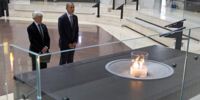 President Barack Obama and Nobel Peace Prize laureate and Holocaust survivor Elie Wiesel stop for a moment of silence in the Hall of Remembrance as they toured the Holocaust Memorial Museum in Washington, Monday, April 23, 2012. (AP Photo/Carolyn Kaster)