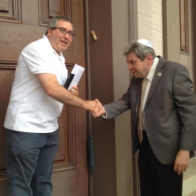 Rabbi Mintz and Marvin shake on a job well done!