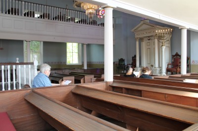 Participants drawing the inside of the Lloyd Street Synagogue in August.
