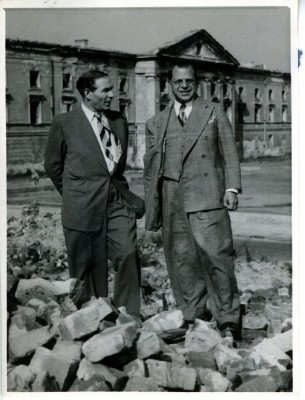 Harry Greenstein (right) and William Bein (left) JDC Director for Poland, standing on rubble of Warsaw Ghetto, Poland, 1949. JMM 1971.20.214