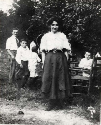 ”Paradise Home” in Catonsville. It was purchased by the Hebrew Benevolent Society to provide mothers and babies with country vacations. This was the earliest forerunner of Camp Woodlands, and later, New Camp Milldale. In the background is Dr. Harry Lindeu, medical student, who served as camp doctor. JMM 1995.98.30