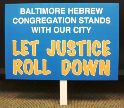 Protest sign from a march/rally/protest held on May 1, 2015 in response to the ongoing uprising/unrest in Baltimore after the arrest and subsequent death of Freddie Gray.  Rally organized by Baltimore United for Change, SEIU, and CASA. These signs were printed up and made available to protesters who did not make or bring their own. JMM K2015.2.1