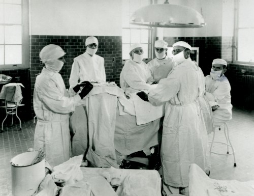 Doctors and nurses who covered heads and faces, gloved their hands, draped pristine linens on their patients, and tossed used instruments into sterilized enameled basins marked the up-to-date- surgical procedures at the Hebrew Hospital and Asylum, c. 1920. Gift of the Baltimore Jewish Times, 2012.054.351.017.