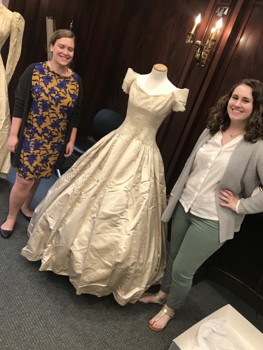 Posing with one of the many wedding dresses for Just Married!