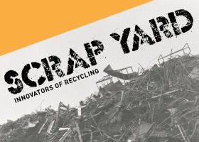 A black and white image of a scrap yard, which has a big pile of junk. On the the picture are the words “Scrap Yard: Innovators of Recycling” in black and an orange accent stripe at the top of the image.