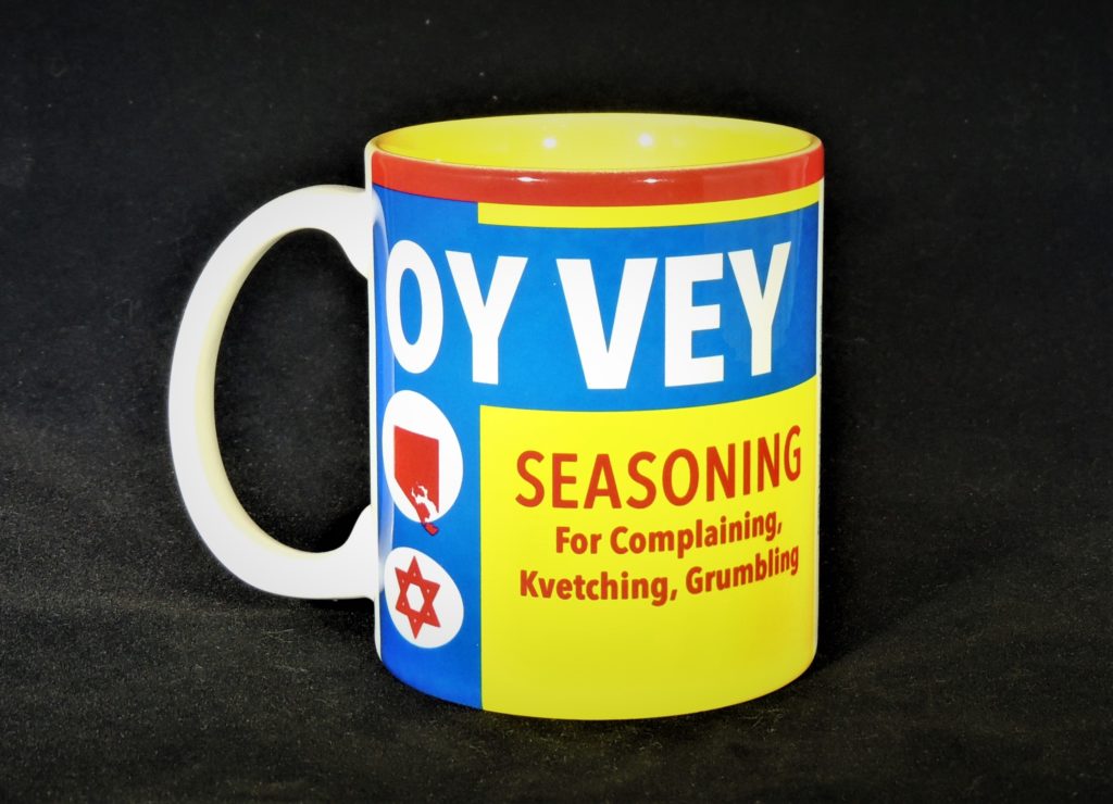 Oy Vey seasoning mug. A Jewish play off the famous Maryland spice, this mug features Baltimore city, the Star of David, and fun Jewish wit all back-dropped by the spice’s colors.