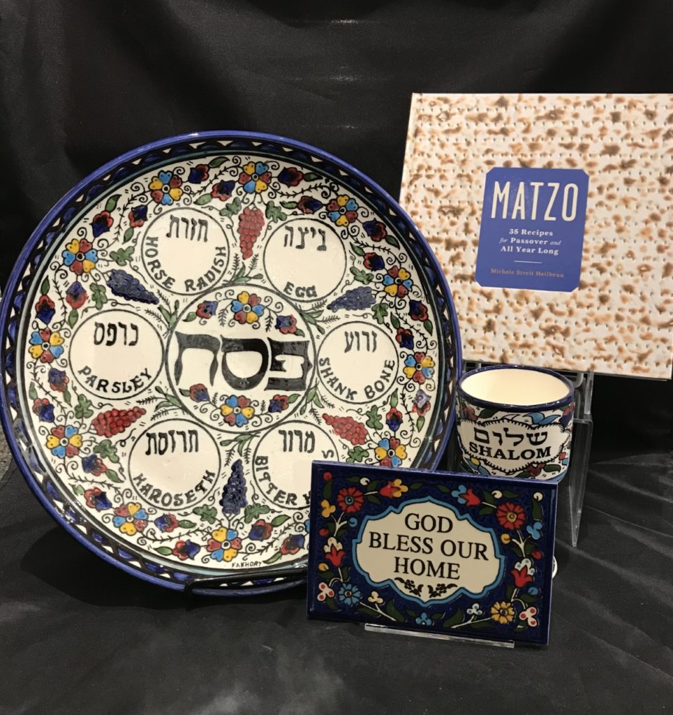 seder plate, cup, small plaque in traditional patterning