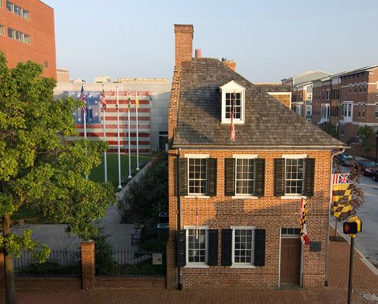 The Star-Spangled Flag House, a three story brick building in the colonial style.